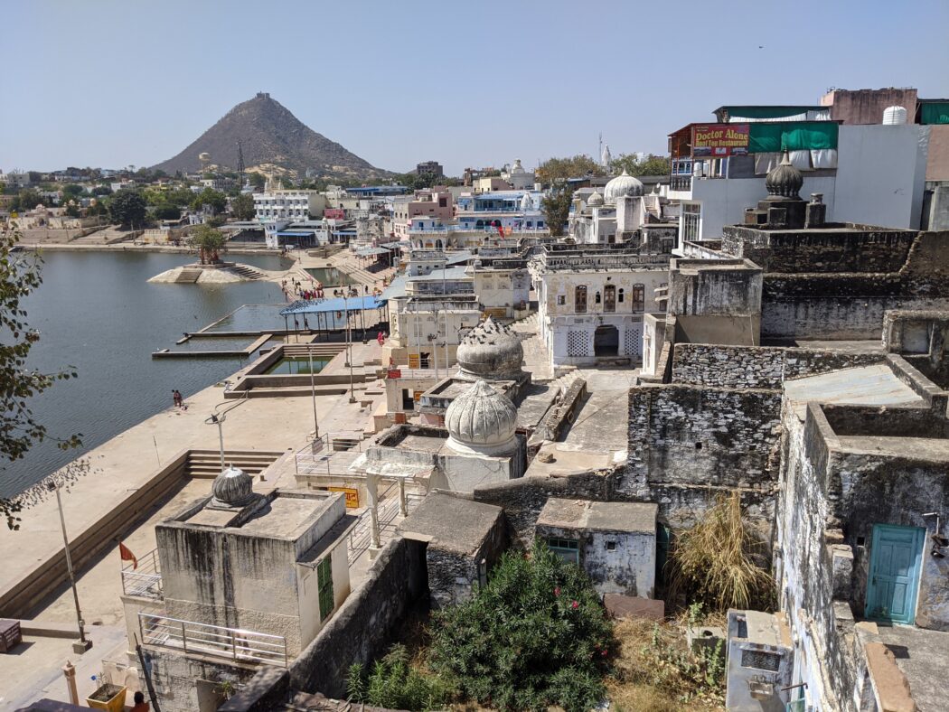 View of Pushkar buildings, lake and mountain
