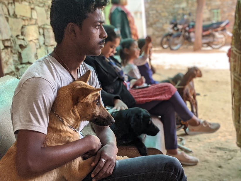 Dog and owner waiting at the pet clinic